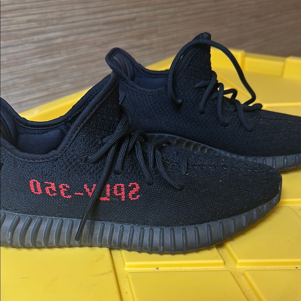 Yeezy Black and Red Primeknit Sneakers